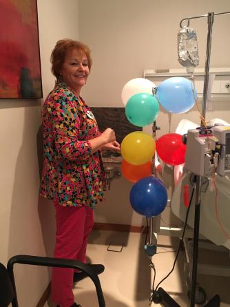 A IV bag holder is way more fun with balloons